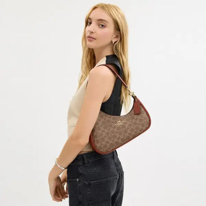 C-O-A-C-H Twisted Teri Shoulder Women Bag – Signature Canvas Edition (Brown-2)