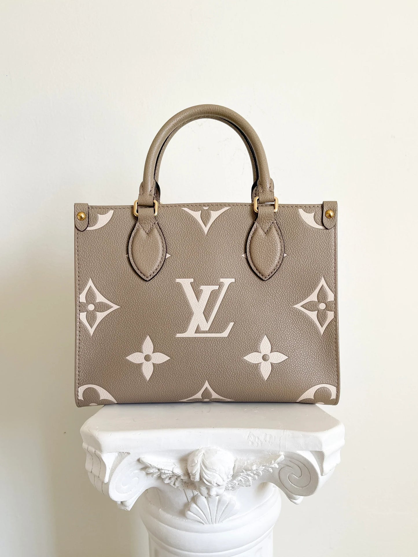 Louis Vuitton Onthego PM Women Bag - Beige-Cream Monogram Empreinte Leather