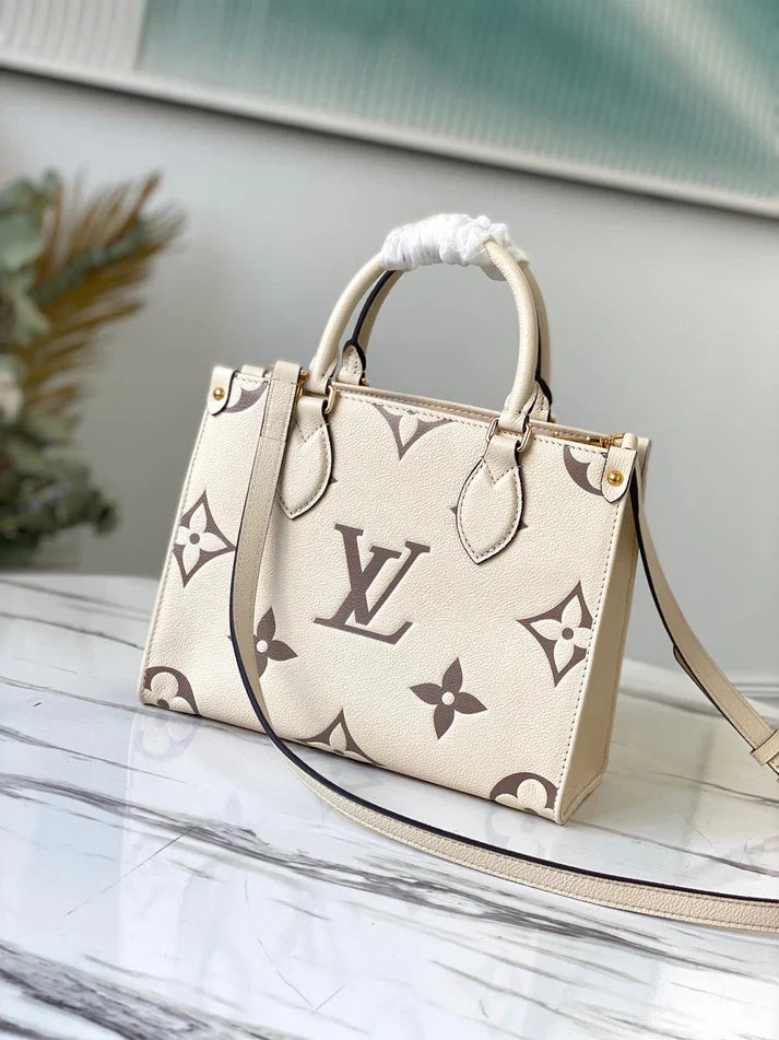 Louis Vuitton Onthego PM Women Bag - White/Cream Monogram Empreinte Leather