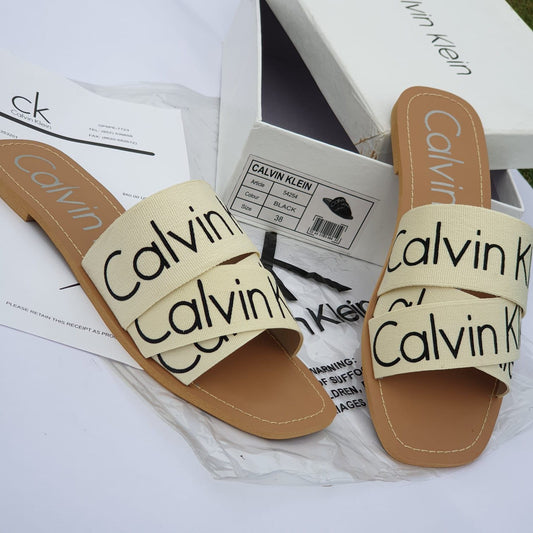 Calvin Klein Flat Slippers – Comfortable Women’s Footwear with Brand Box (Cream/Brown)