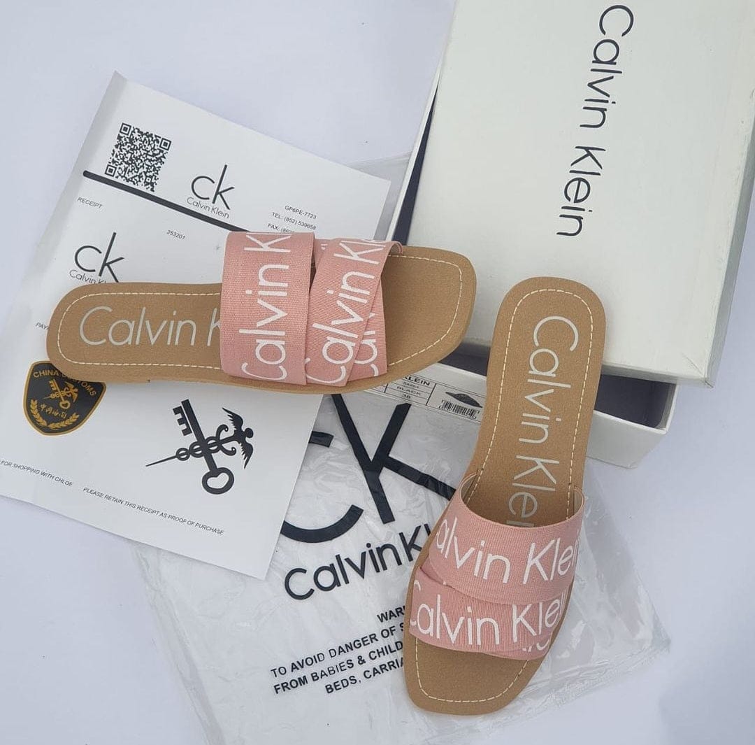 Calvin Klein Flat Slippers – Comfortable Women’s Footwear with Brand Box (Pink/Brown)