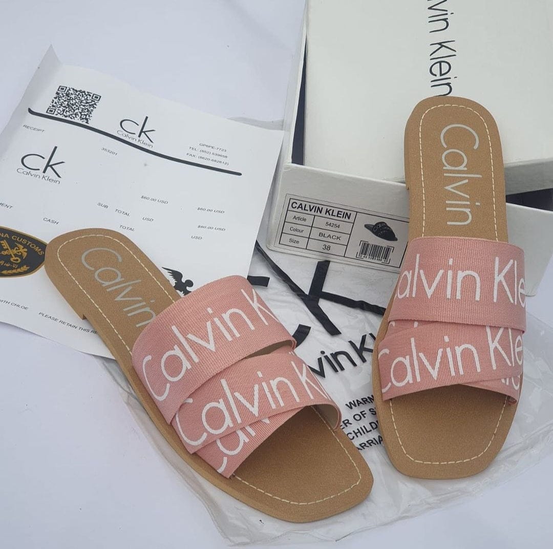 Calvin Klein Flat Slippers – Comfortable Women’s Footwear with Brand Box (Pink/Brown)