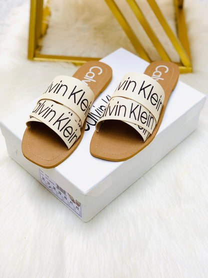 Calvin Klein Slippers – Supreme Comfort & Style (Beige-White)