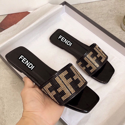FENDI Stone Women Slippers – Elegant & Stylish Comfort (Black/Gold)