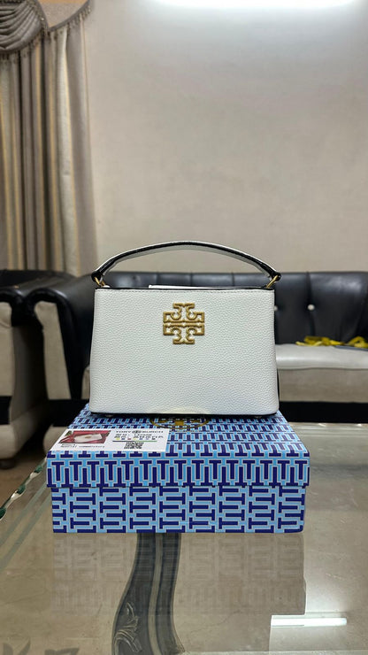 Tory Burch – Signature Style & Premium Craftsmanship (White)