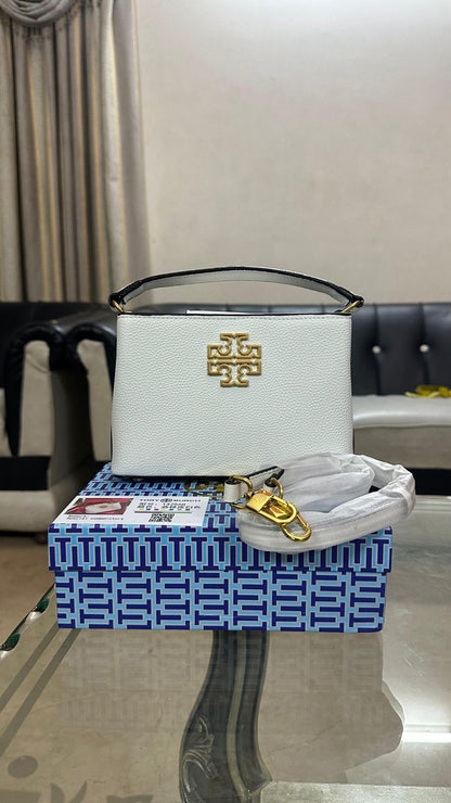 Tory Burch – Signature Style & Premium Craftsmanship (White)