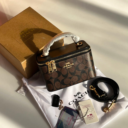 C-O-A-C-H Cosmetic Case in Signature Canvas – Premium Travel & Makeup Organizer (Brown)