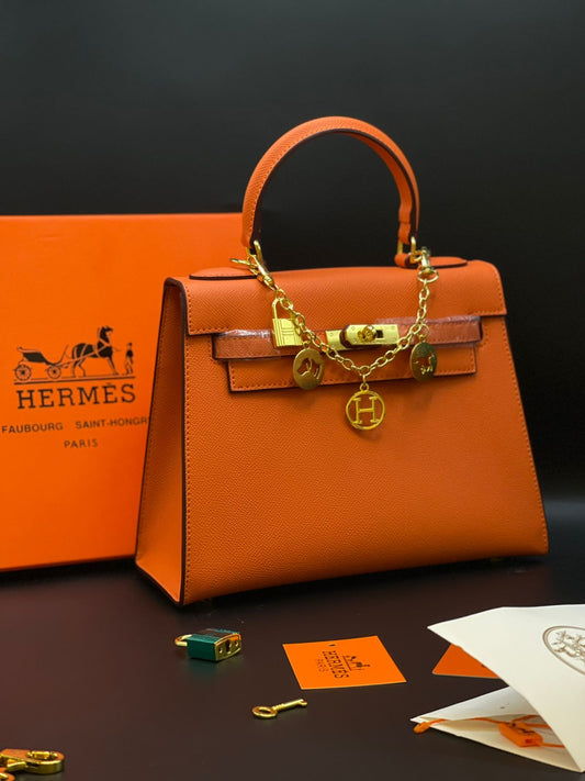 H-E-R-M-È-S Kelly Luxury Structured Top Handle Women Bag With Charm – Premium Edition (Orange)