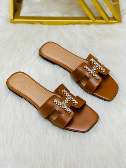 H-E-R-M-È-S Stone Flat Slippers – Elegant Women Footwear (Brown)
