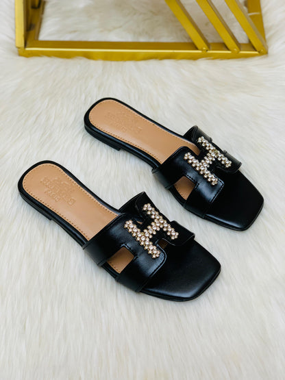H-E-R-M-È-S Stone Flat Slippers – Elegant Women Footwear (Black)