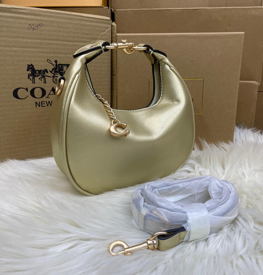 C-O-A-C-H Jonie Plain Mini Women Bag – Compact Luxury Edition (Gold)