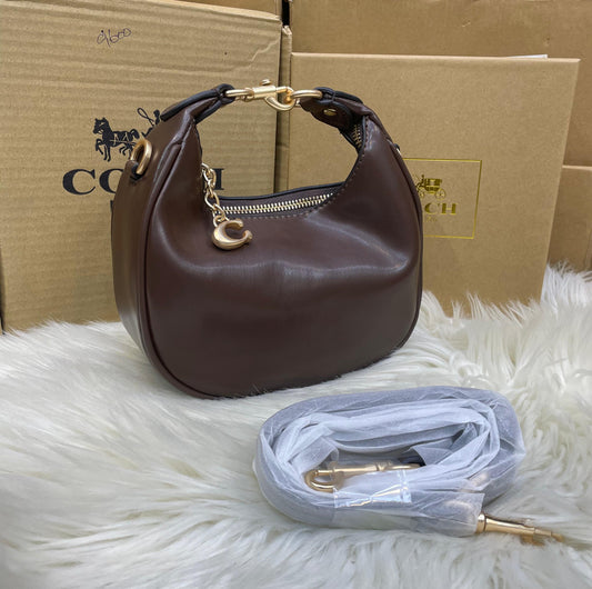 C-O-A-C-H Jonie Plain Mini Women Bag – Compact Luxury Edition (Brown)