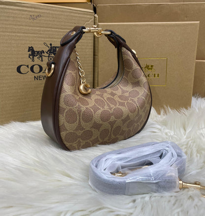 C-O-A-C-H Jonie Mini Women Bag – Compact Luxury Edition (Brown-1)