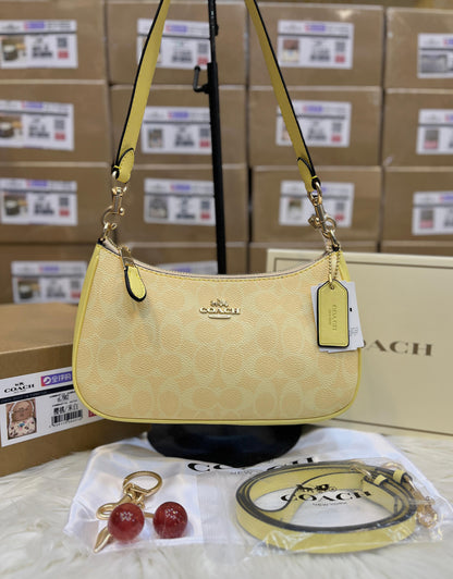 C-O-A-C-H Teri Shoulder Women Bag in Signature Canvas (Yellow Beige)