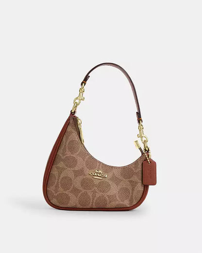 C-O-A-C-H Twisted Teri Shoulder Women Bag – Signature Canvas Edition (Brown-2)