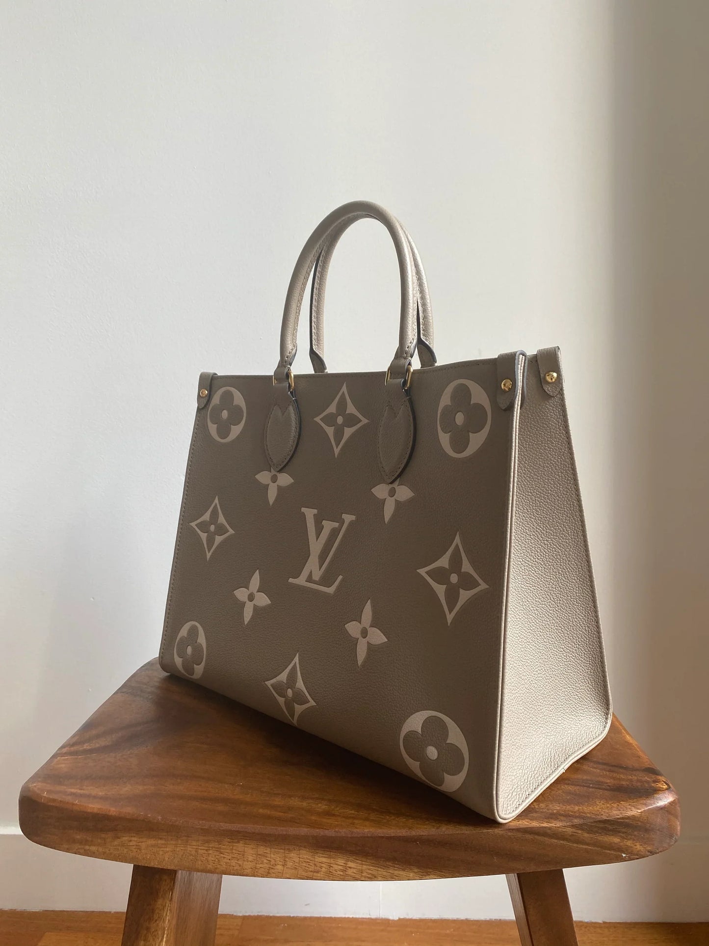 Louis Vuitton Onthego PM Women Bag - Beige-Cream Monogram Empreinte Leather