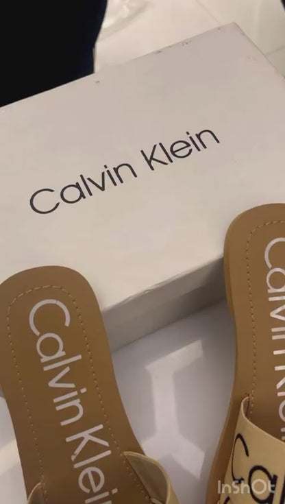 Calvin Klein Flat Slippers – Comfortable Women’s Footwear with Brand Box (Pink/Brown)